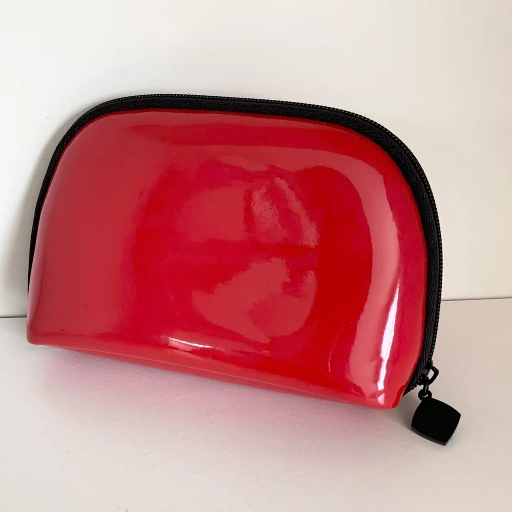 Hold Chanel Red zippy pouch